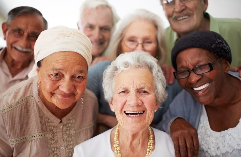 Group of diverse older adults in a social setting