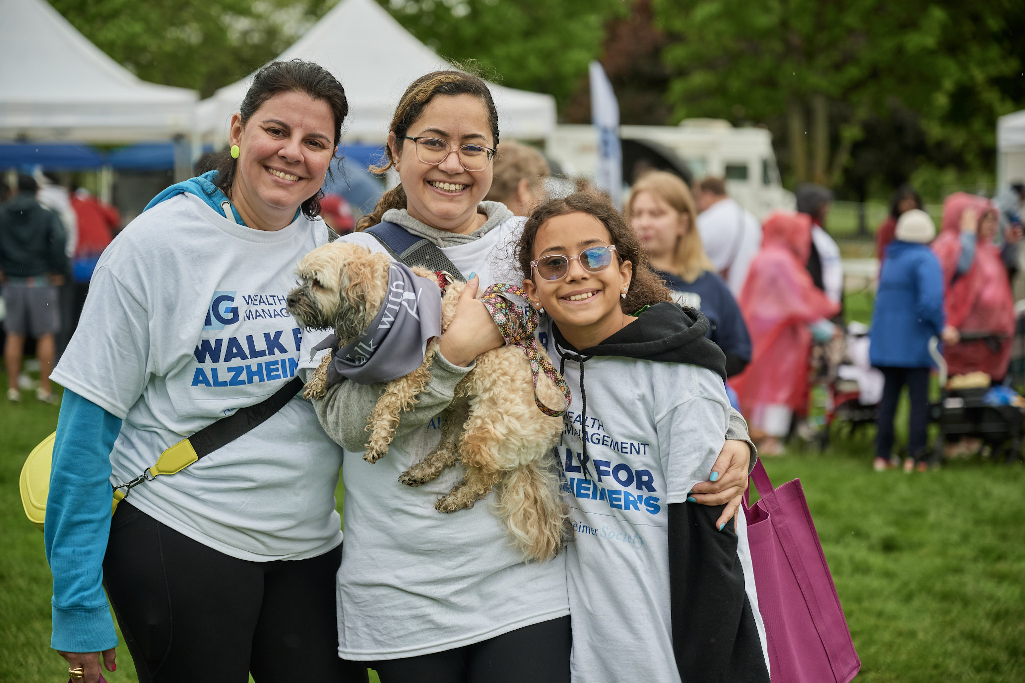 family of three and their dog at the Toronto Walk for Alzheimer's